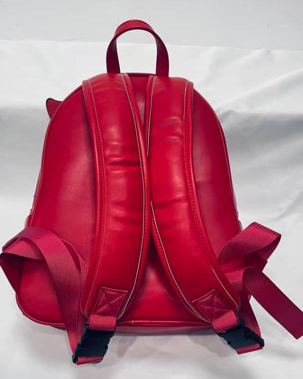 Red backpack on a white background