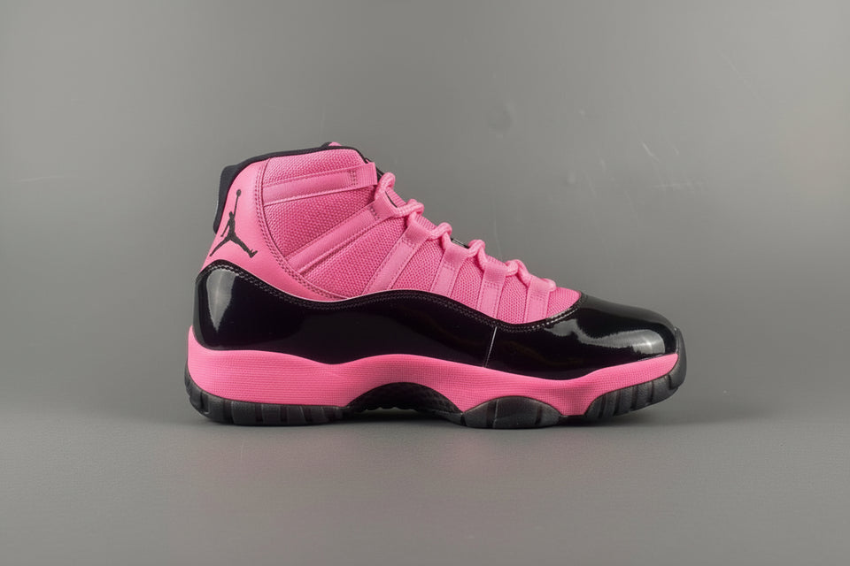 Pink and black high-top sneaker with a brand logo on a gray background