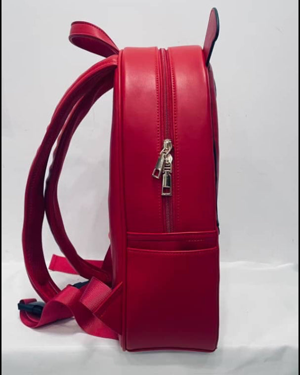 Red backpack with a visible brand logo on a white background